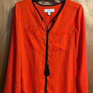 Red/Scarlet blouse with black tassels